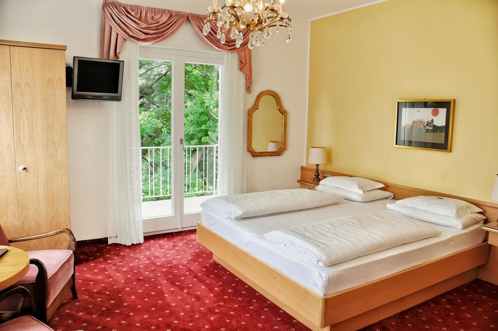 Hotel Zima Merano Habitación foto